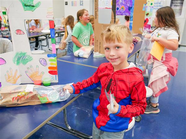 Students participating in Market Day. 